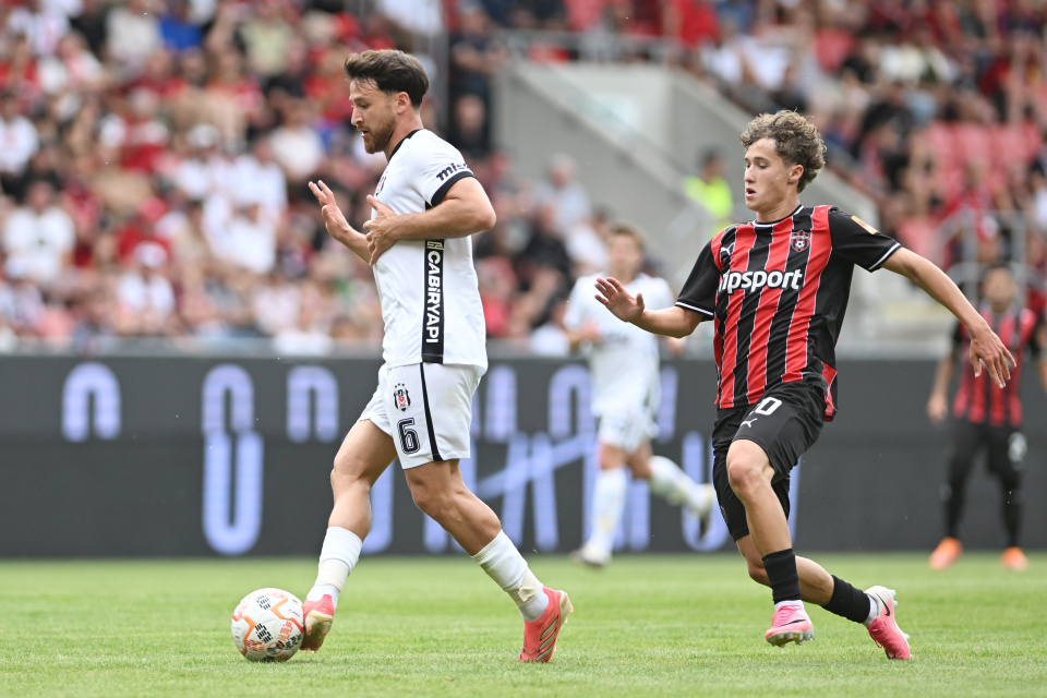 Hráč Trnavy Filip Trello a hráč Besiktasu Salih Ozcan počas priateľského zápasu  FC Spartak Trnava - Besiktas Istanbul | Zdroj: TASR/Lukáš Grinaj