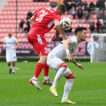 Vpravo hráč Trnavy Martin Bukata a hráč Trenčína Filip Bainovič počas zápasu 21. kola futbalovej Fortuna ligy medzi FC Spartak Trnava - AS Trenčín v sobotu 19. februára 2022 v Trnave. | Foto: Lukáš Grinaj